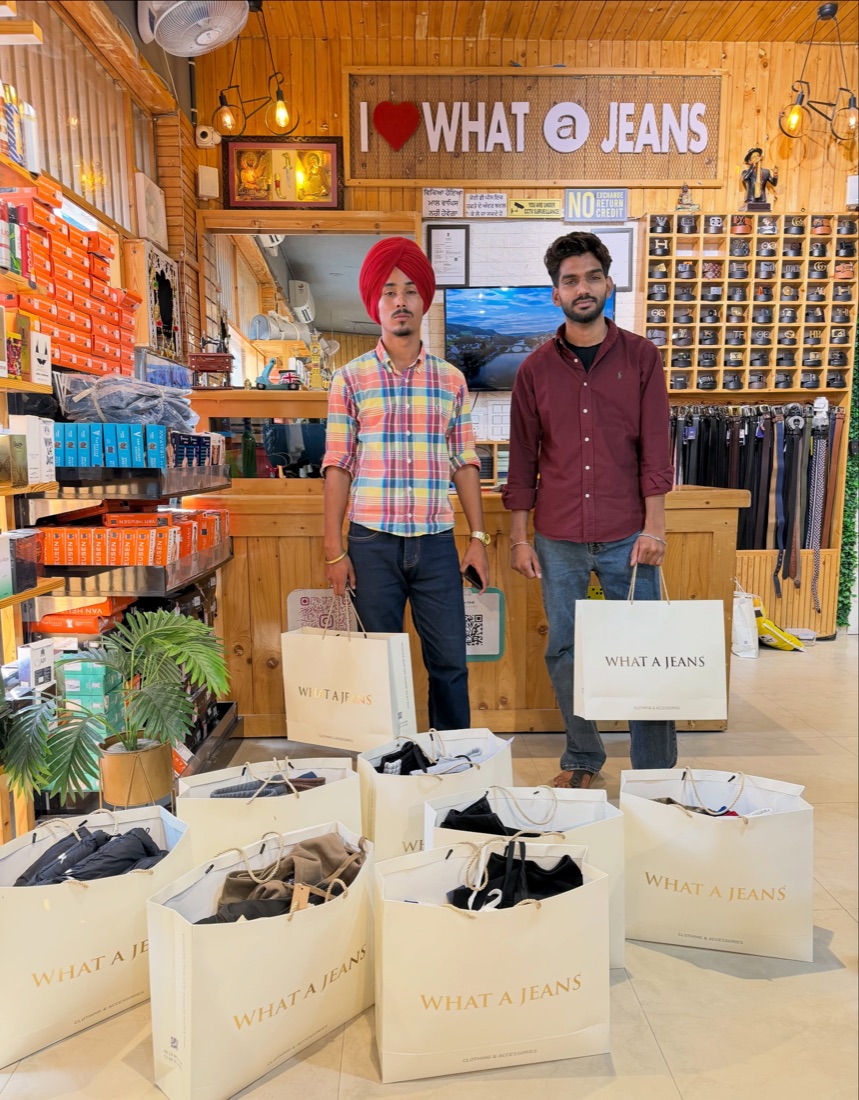 Customers with a big What A Jeans haul
